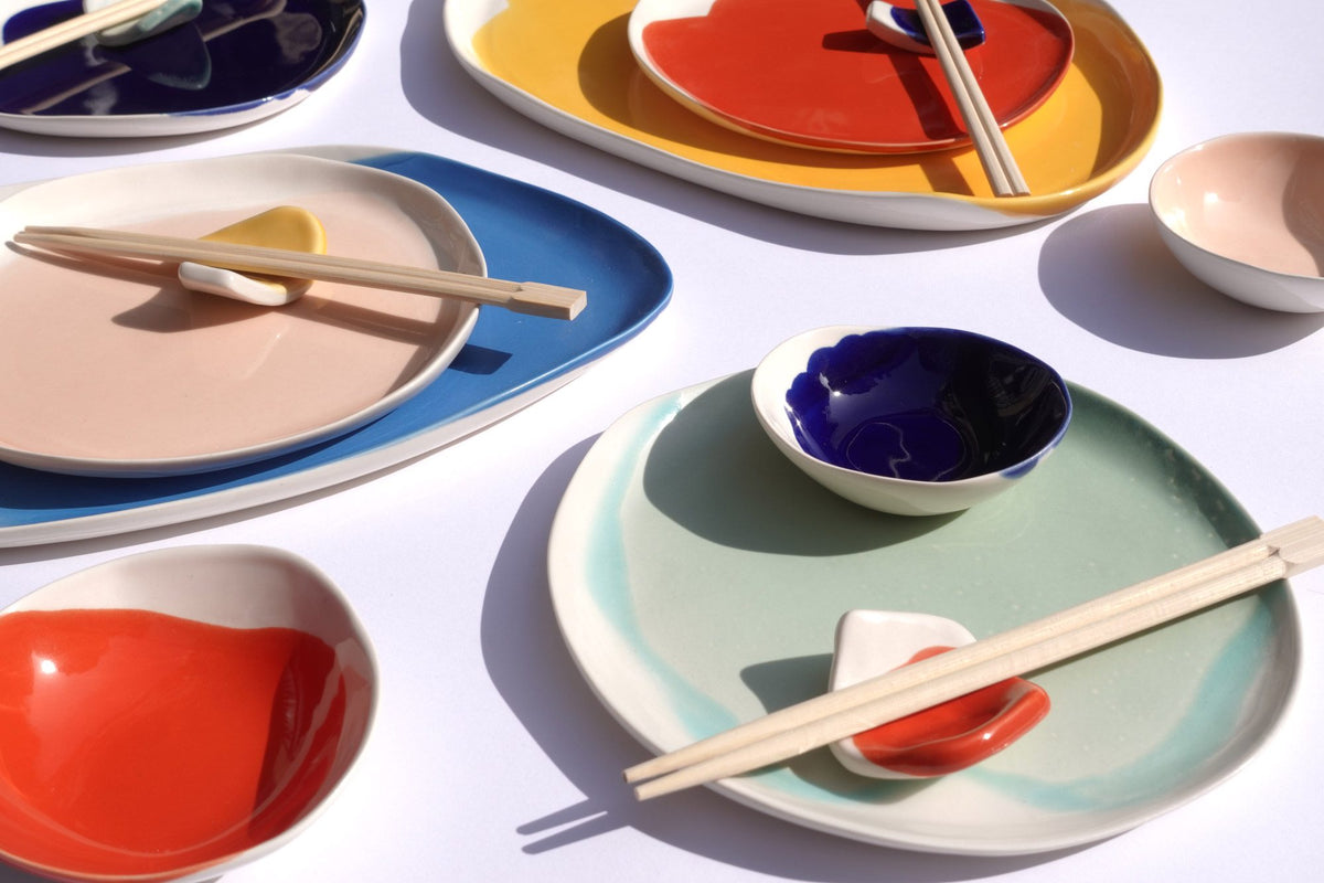 Handmade porcelain sushi set with colourful glazed plates, dipping bowls and chopsticks from the Color collection