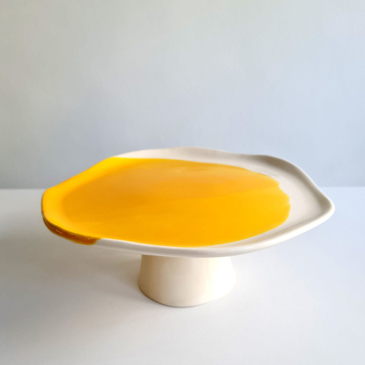 cadmium yellow cake stand