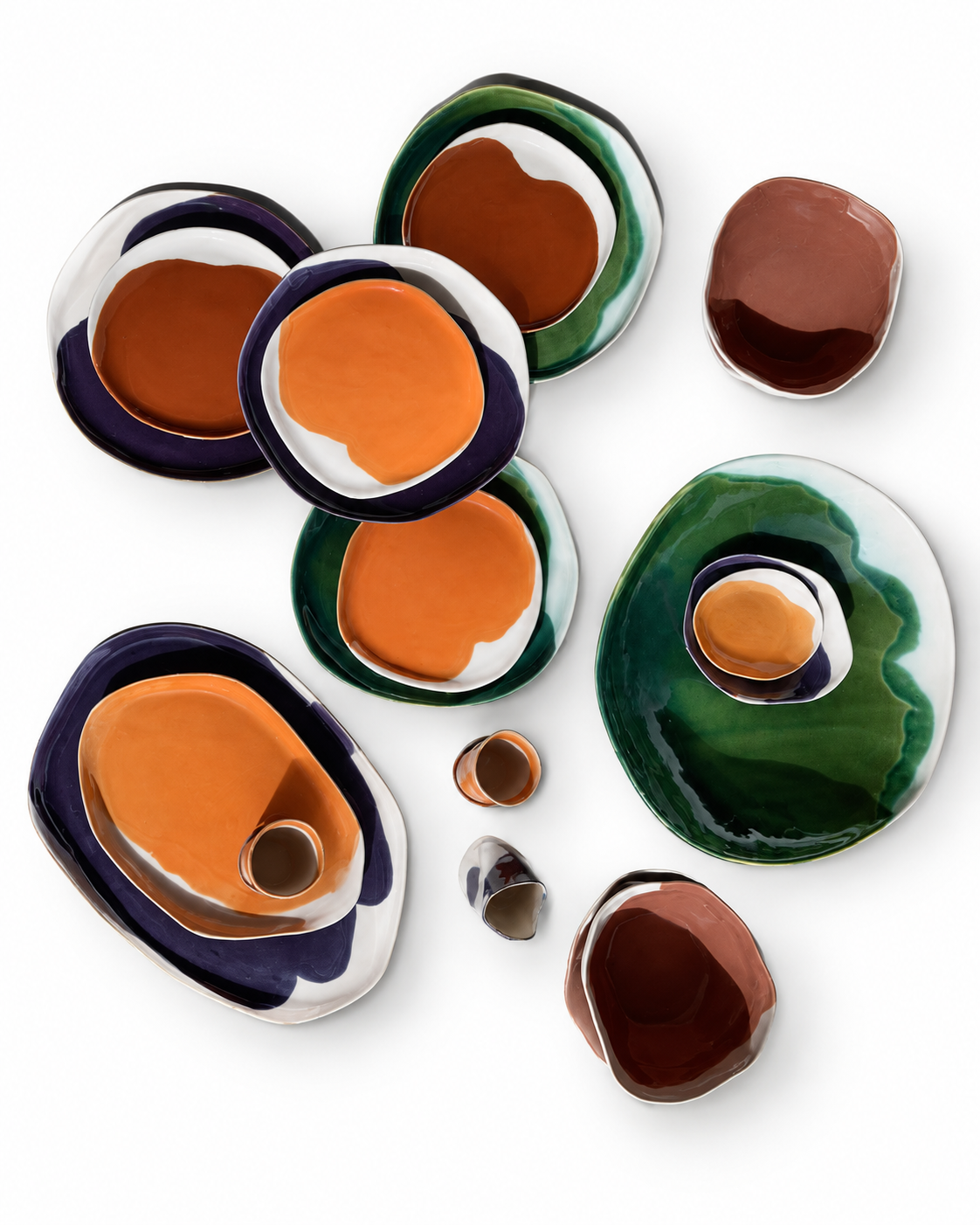 Autumn Table dining ceramics in Moss Green, Aubergine, Saffron and Chocolate; coffee pieces sold separately