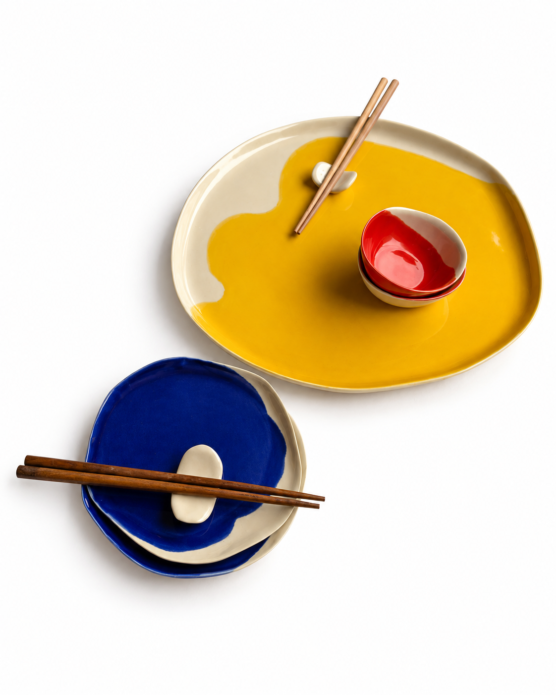 Bauhaus handmade ceramic sushi set for two with a 32 cm cadmium yellow serving plate, 16 cm ultramarine plates, scarlet red dip bowls and ceramic chopstick rests – view 7