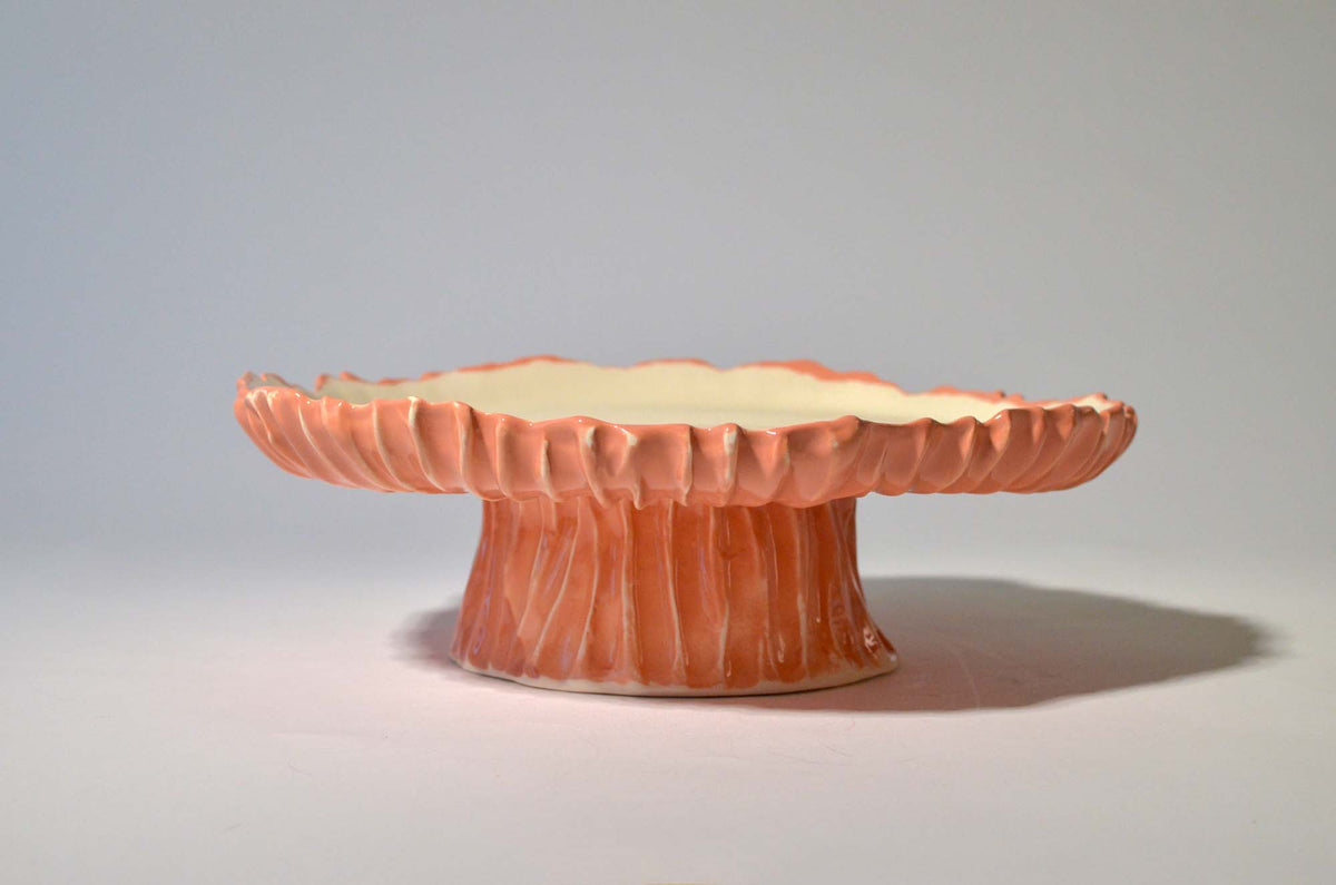 Pink Blossom cake stand with a wide fluted top and ribbed base