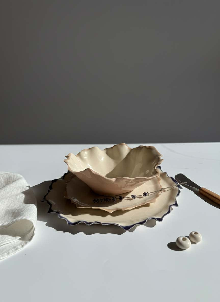 Handmade Blossom plates and bowl with folded ivory and bronze-toned rims