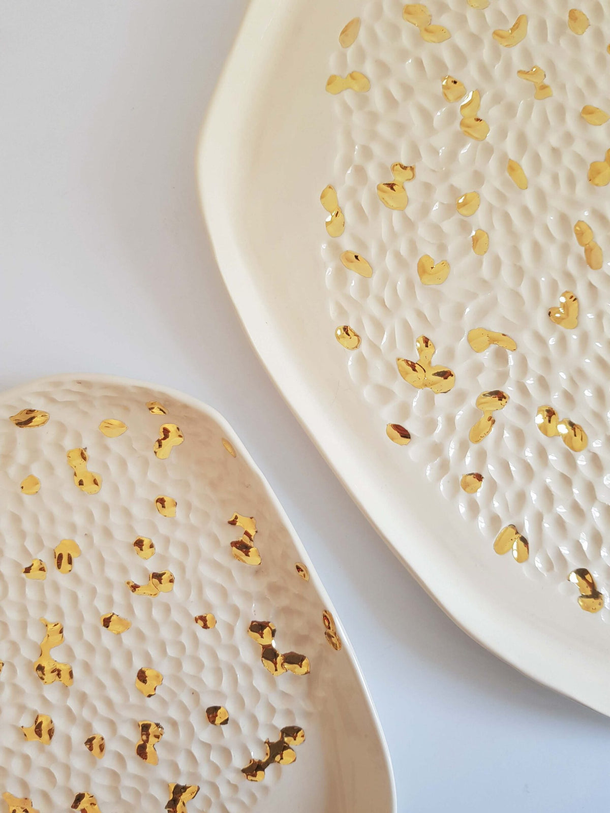 Lustre collection porcelain plates with hammered texture and scattered gold lustre accents