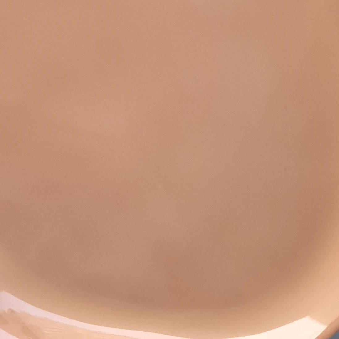 Mocha Mousse glossy glaze sample on handmade porcelain in a warm pinkish-brown tone