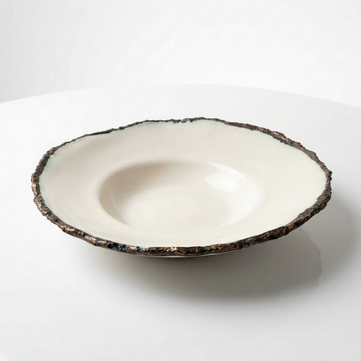 Handmade deep porcelain plate with bronze and green patina rim for restaurants – view 2