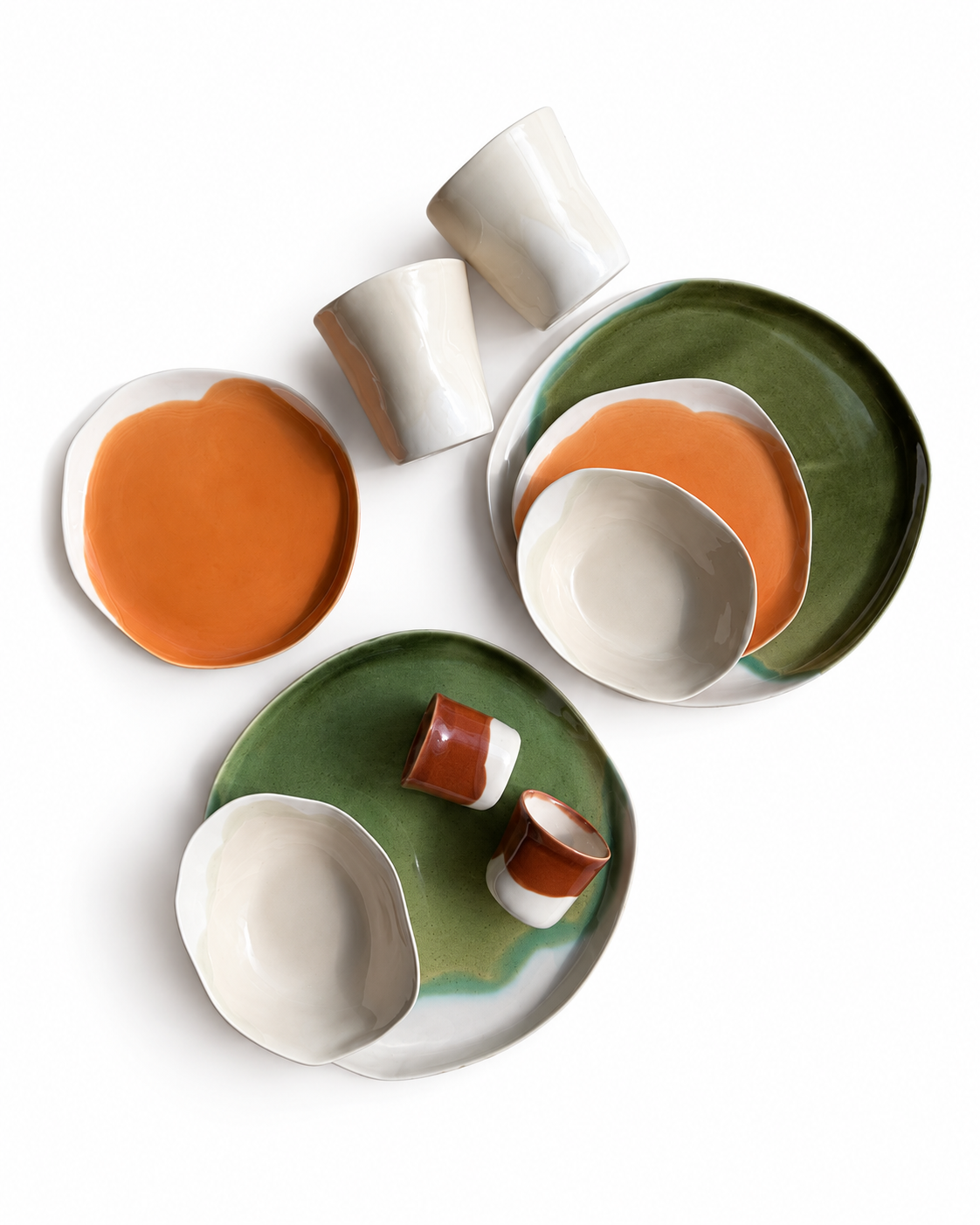 Overhead view of the ten-piece Autumn / Winter dinner set on a white background