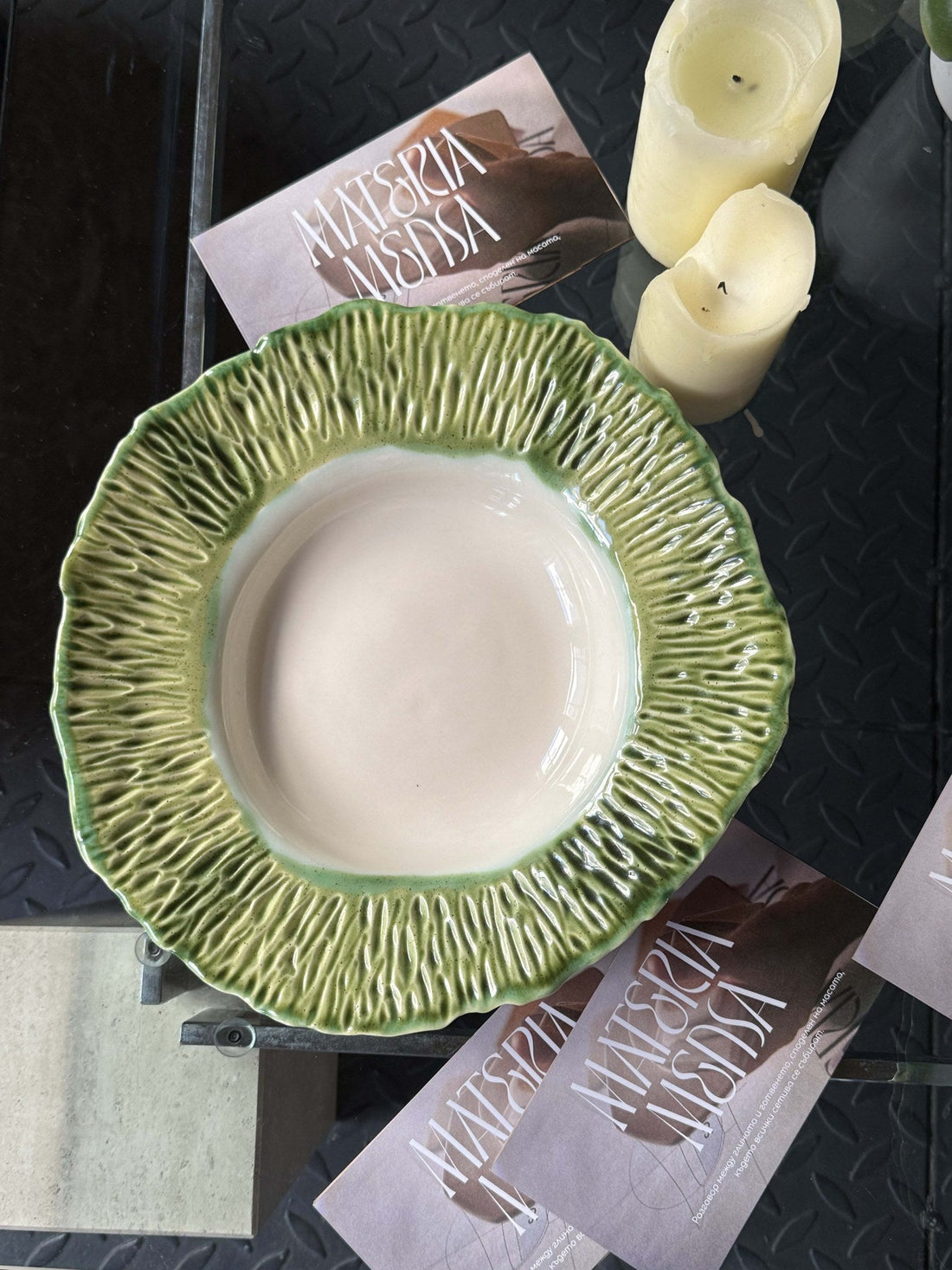 Empty deep porcelain plate, 28 cm, with hand-textured green rim and white well