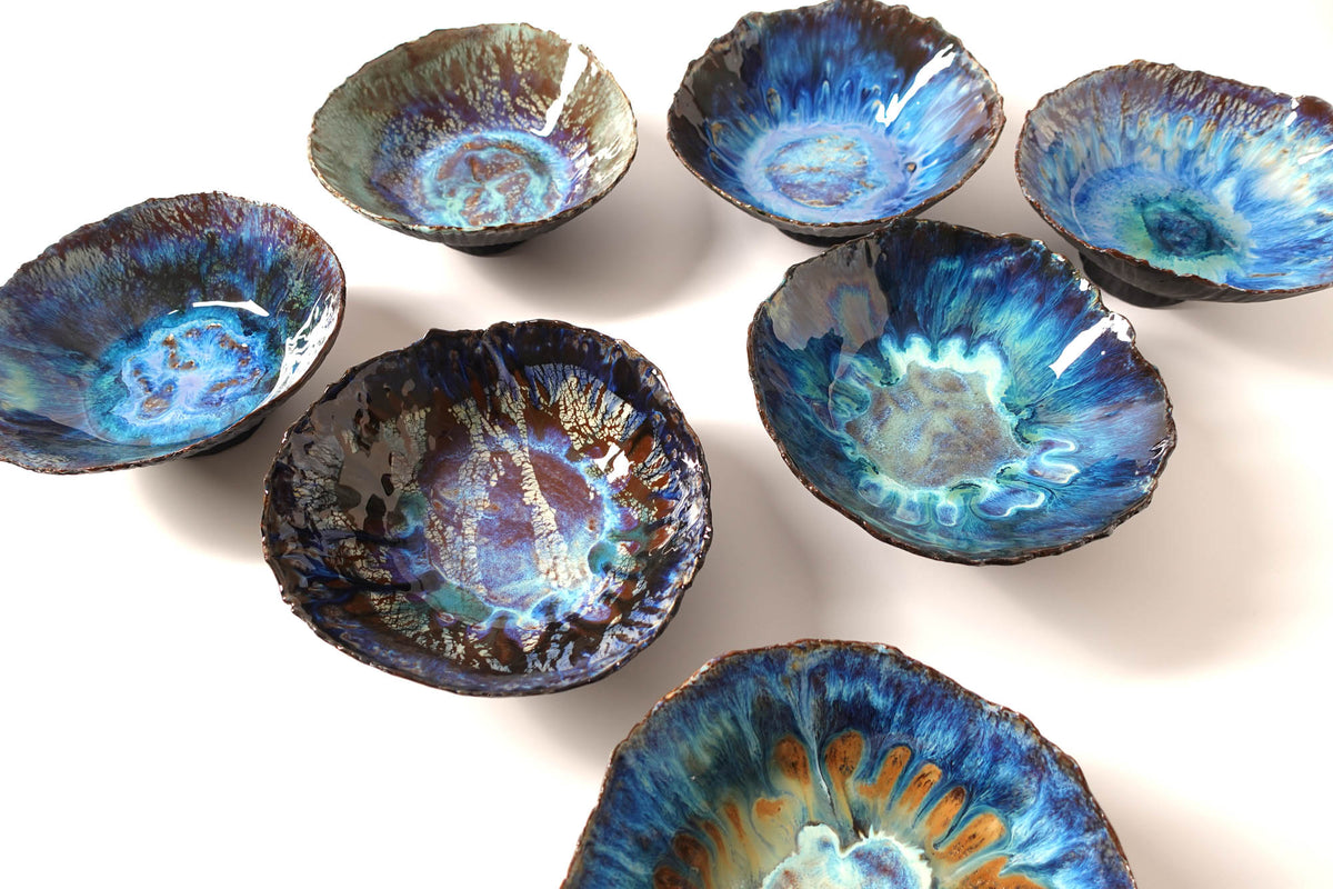 Universe bowls in iridescent blue glaze, custom made for Chef Bruno Verjus in Paris
