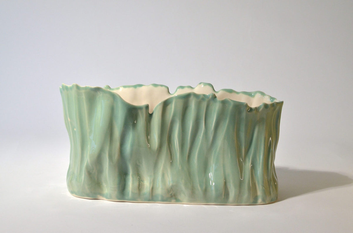 Sculptural wide porcelain vase in Sage Green glaze with vertical ridged texture and organic rim