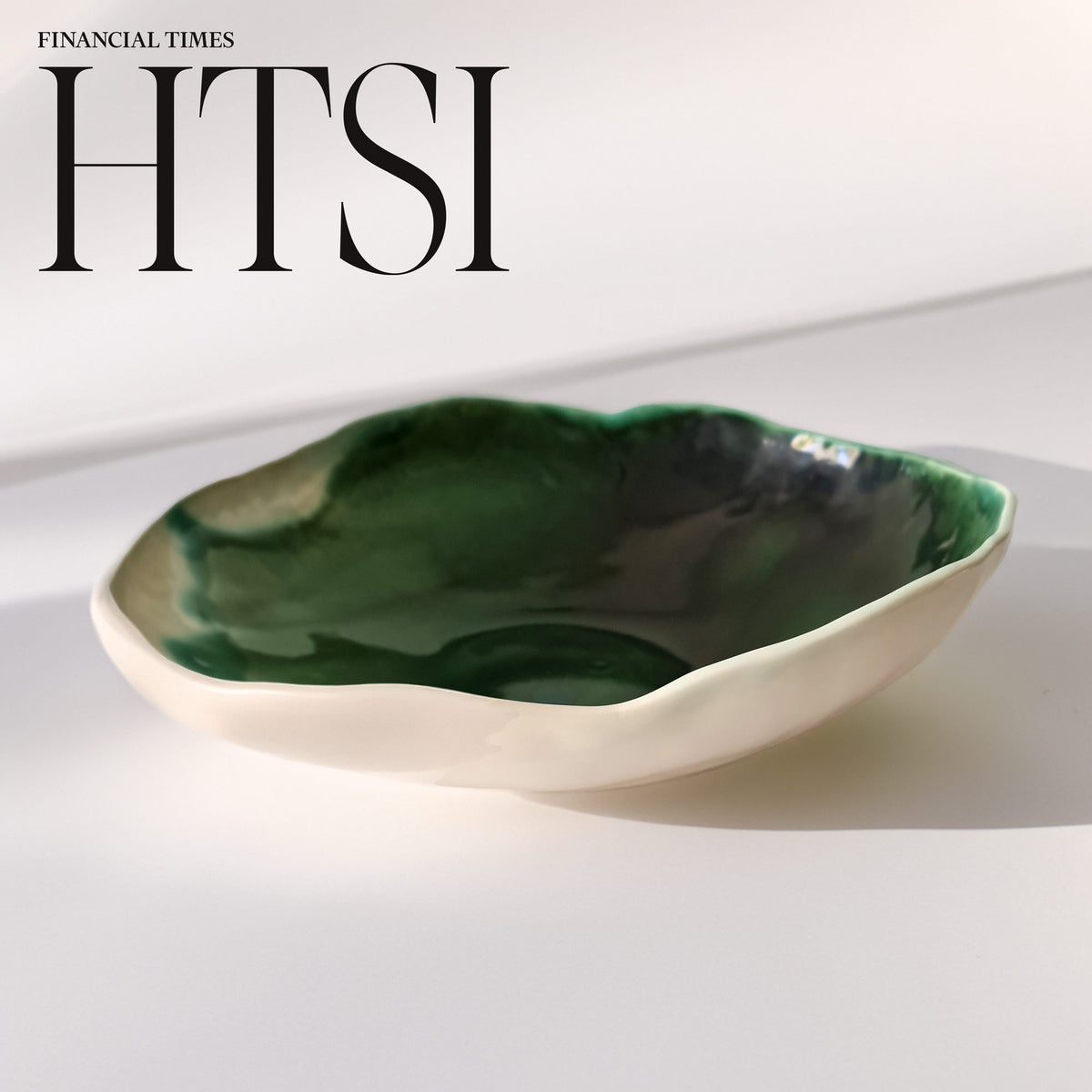 Large porcelain serving bowl in Forest Green glaze, as featured in HTSI by the Financial Times