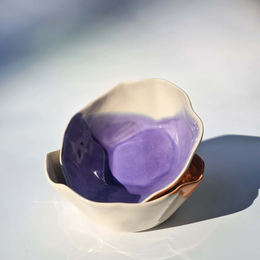 Stacked lavender and ivory handmade ramen bowls