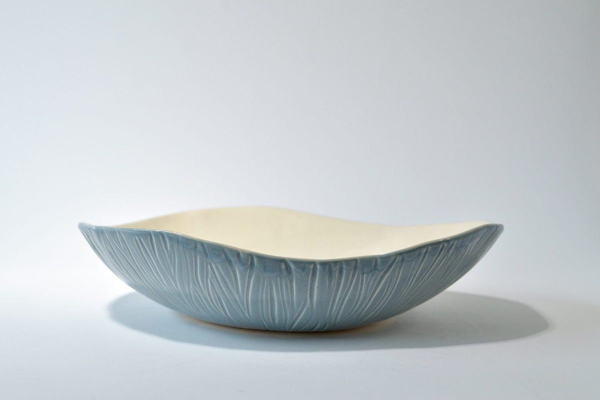 Textured large porcelain serving bowl in Light Denim glaze with a creamy white interior
