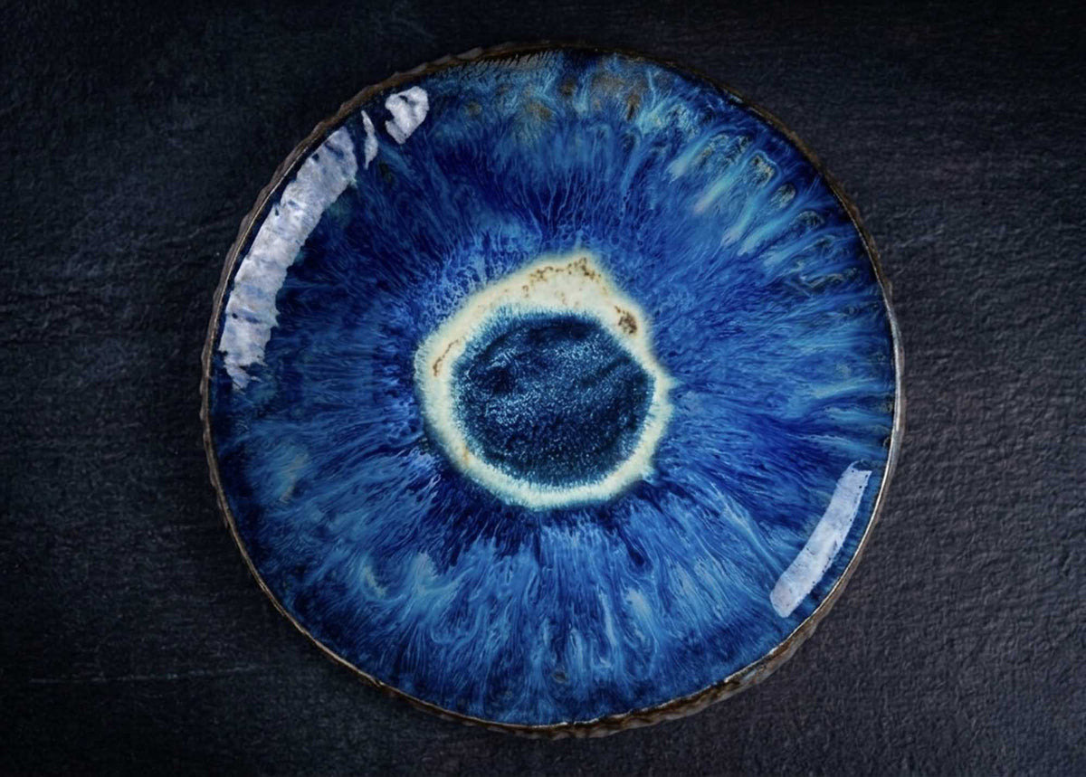 Textured Plate from Black Clay in deep cobalt blue glaze with a pale ring at the centre