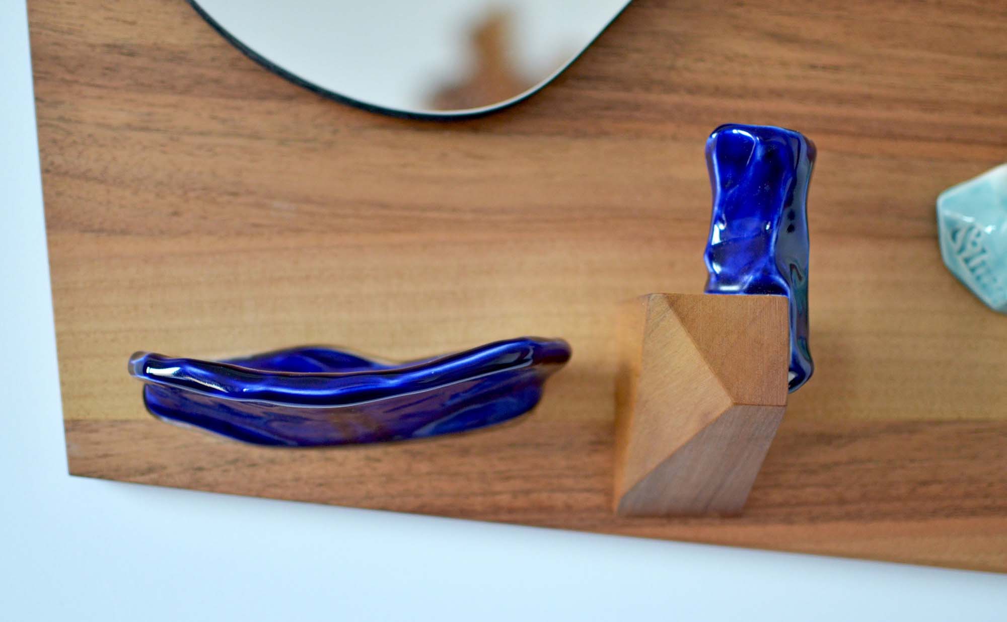 walnut wood and porcelain mirror