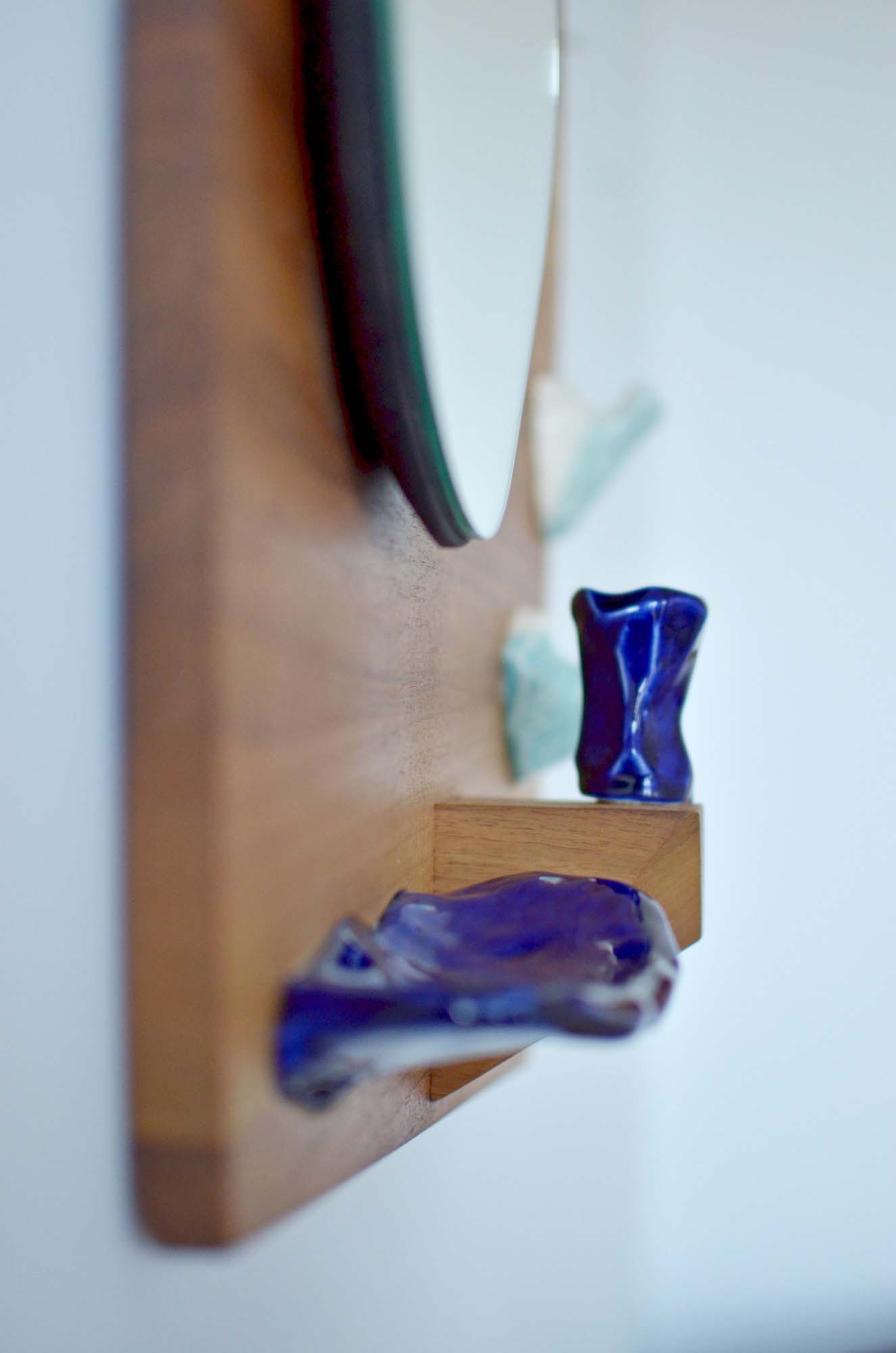 walnut wood and porcelain mirror