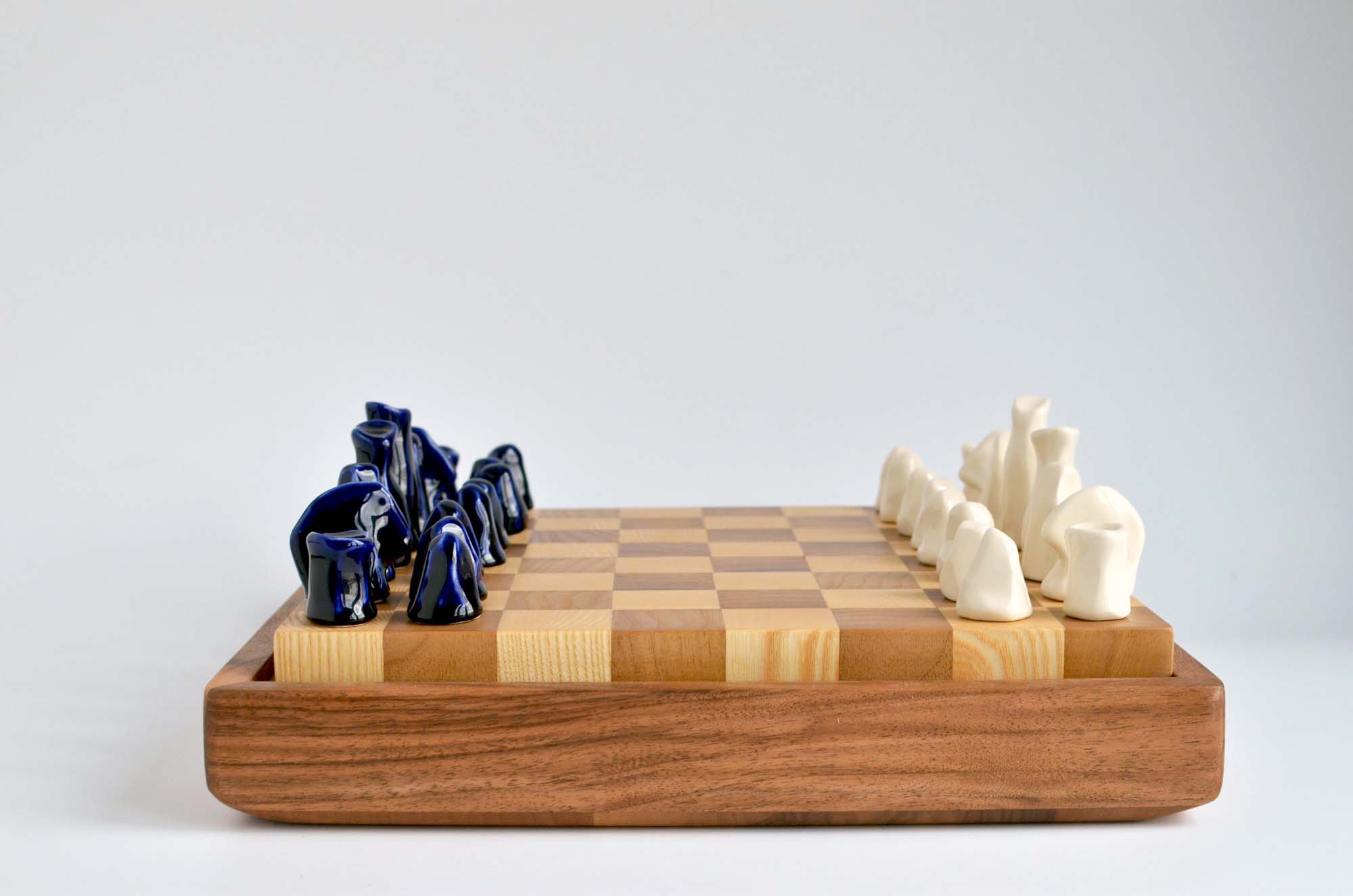 wooden chess set porcelain figurines