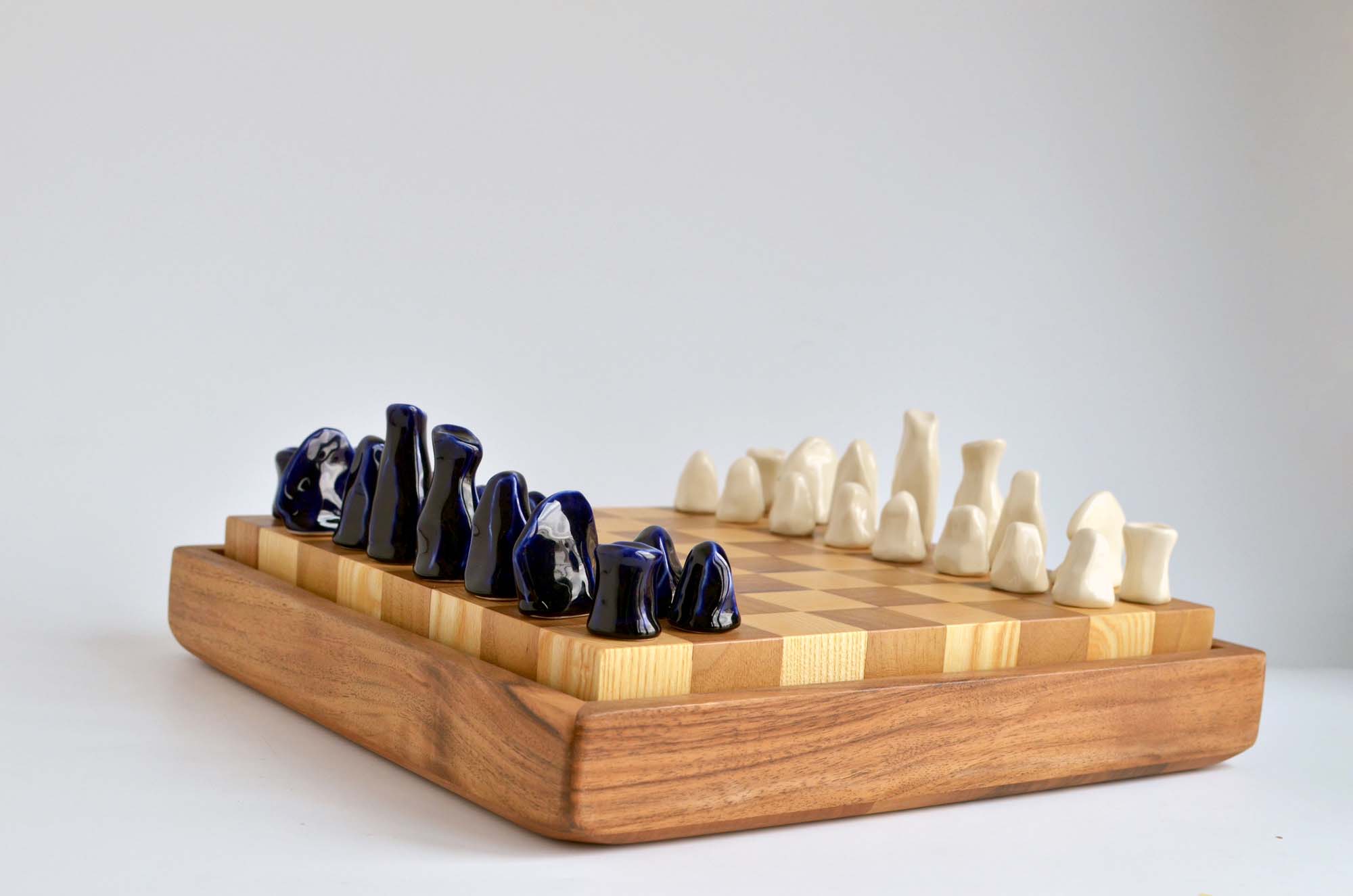 wooden chess set porcelain figurines