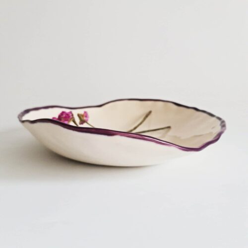 white bowl with aubergine color edge