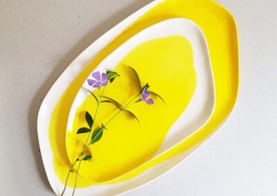 lemon yellow plates set with flowers
