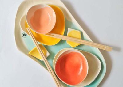 Turquoise sushi set with color plates and dipping bowls