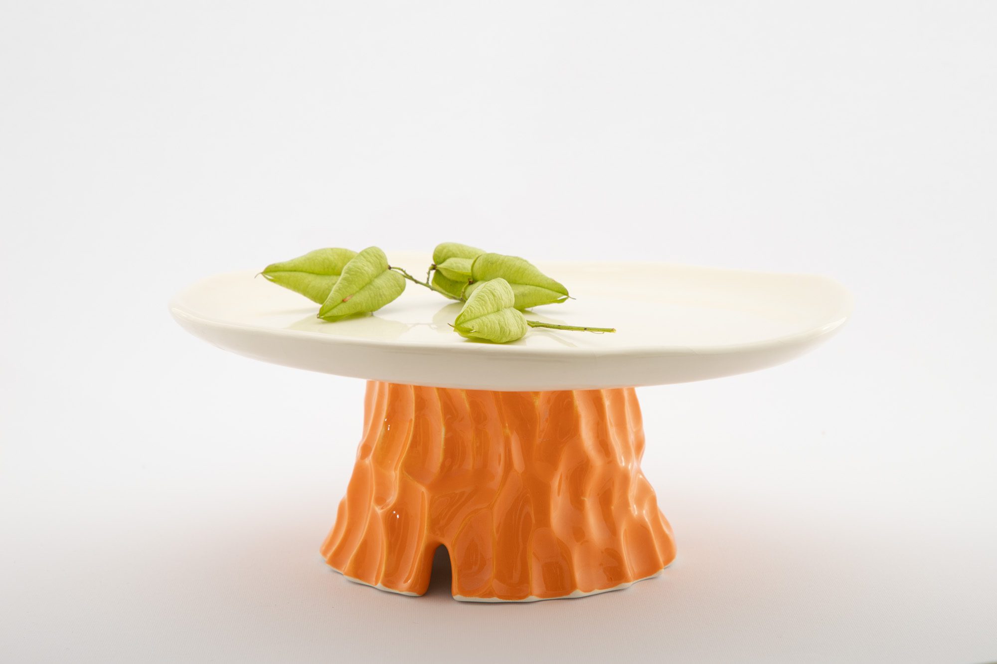 Porcelain handmade cake stand with orange stand