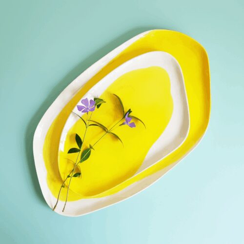 Signature porcelain set from Pottery and Poetry - yellow plates with flower
